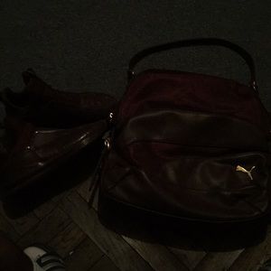 Maroon puma bag with matching puma sneakers